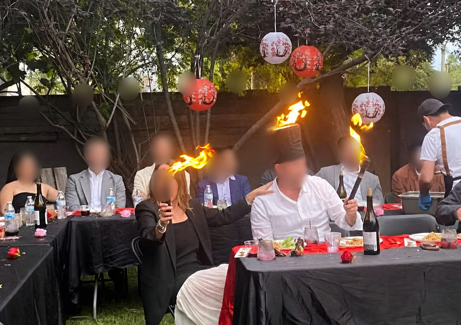 Sizzle Social Hibachi fire show moment at a private backyard party