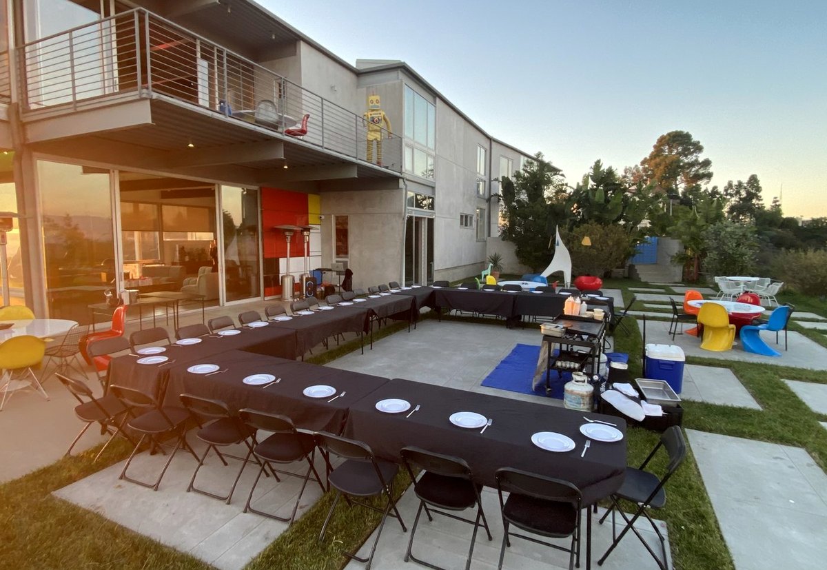 Backyard hibachi table setup at sunset